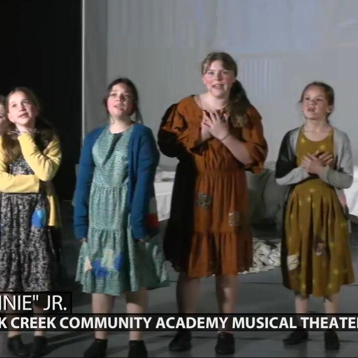 Keith Kaiser hears another song and sings along with the cast